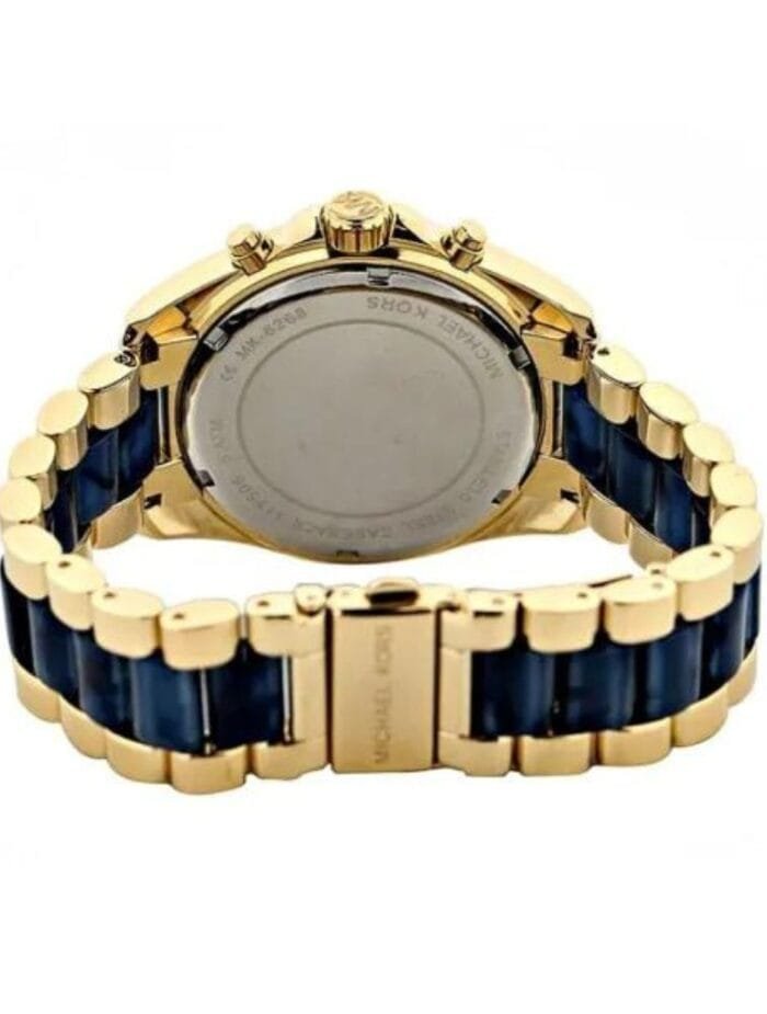 Marque: Michael Kors Modèle: Bradshaw Boîtier: Diamètre :43 mm Epaisseur : 13 mm Acier inoxydable Doré Cadran: Verre : Minéral Doré Bracelet: Largeur : 20 mm Acier inoxydable Doré Etanchéité: 100 m (10 ATM) Type de boucle: Boucle déployante Détails techniques: Dateur Chronomètre