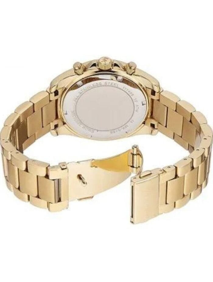 Marque: Michael Kors Modèle:RITZ BLAIR Boîtier: Diamètre : 38 mm Epaisseur : 8 mm Acier inoxydable Bronze Cadran: Verre : Minéral Bronze Bracelet: Acier inoxydable Bronze Etanchéité: 50 m (5 ATM) Type de boucle: Boucle déployant